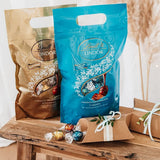 LINDOR chokladbollar med salt kola | ca. 80 mjölkchokladbollar med saltad kolafyllning | Bulk Pack & Marc de Champagne Chokladbollar | 700 g