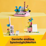 LEGO Creator 3In1 skrivmaskin med blommor - konvertibel leksak till en Keytar-modell eller till en blomkruka med anteckningsbok och penna - byggset - present till flickor och pojkar från 8 år 31169 Byggset Besuche den LEGO-Store
