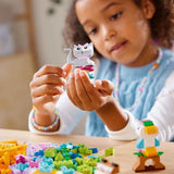 LEGO Classic Creative Animals, låda med färgglada klossar, bygg tegeldjursfigurer som hund, katt, kanin, hamster och fågel, byggleksak för pojkar och flickor från 5 år 11034 Byggset Besuche den LEGO-Store