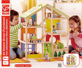 Hape Four Seasons Dollhouse - prisbelönt trevånings dockhus i trä med möbler, tillbehör, skjuttrappa och vändbart tak för alla årstider, för barn från 3 år och uppåt