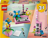 LEGO Creator 3In1 skrivmaskin med blommor - konvertibel leksak till en Keytar-modell eller till en blomkruka med anteckningsbok och penna - byggset - present till flickor och pojkar från 8 år 31169 Byggset Besuche den LEGO-Store