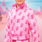 Barbie The Movie - Ken-Sammelpuppe, Ryan Gosling som Ken i rosafarbenem Overall mit "B"-Aufdruck, weißen Sneakern och bunten Inlineskates, JCP80