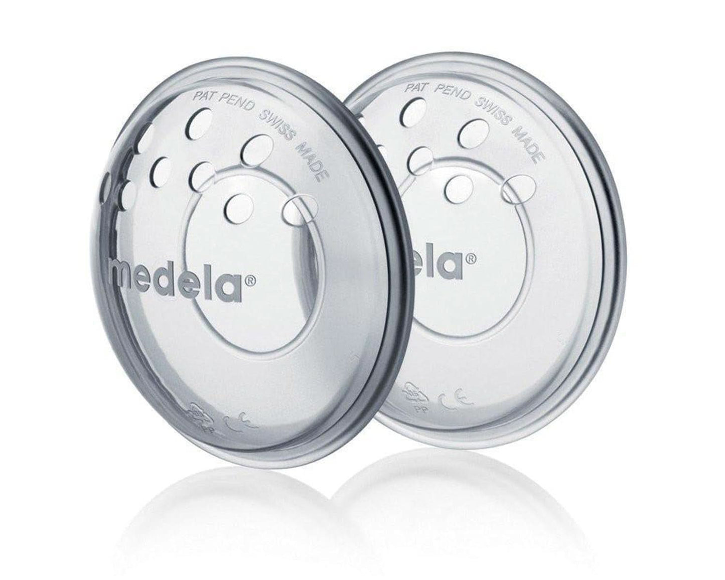 Medela bröstskal - BPA-fria, tillverkade av mjuk silikon, med ventilationshål som andas, inkluderar 2 skal Tillbehör Mat och amning Bebe Naty Shop