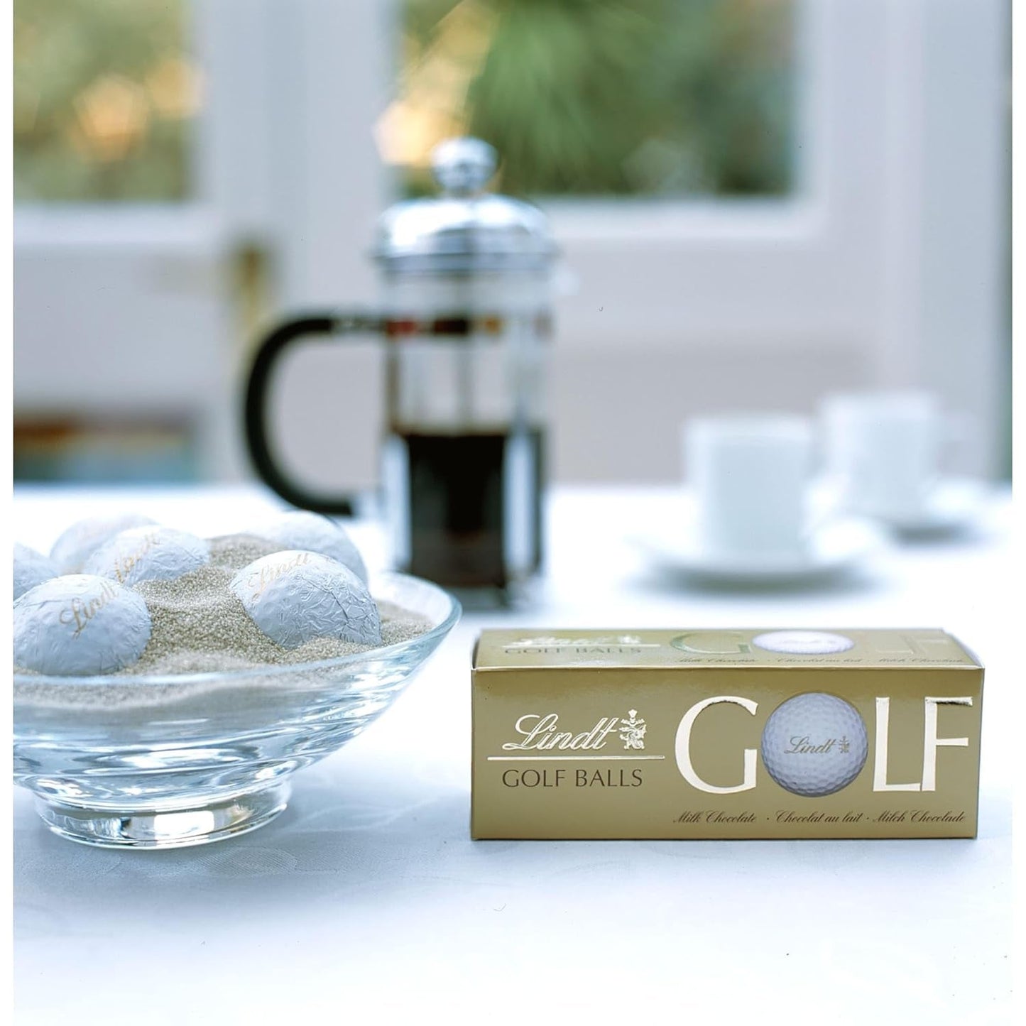 Lindt Schokolade - Golfbollar | 110 G| Drei Golfbälle Aus Lindt Vollmilch-Schokolade Mit Nougatcremefüllung Und Waffelstückchen | Pralinengeschenk | Present till golfare | Schokoladengeschenk Naty Shop
