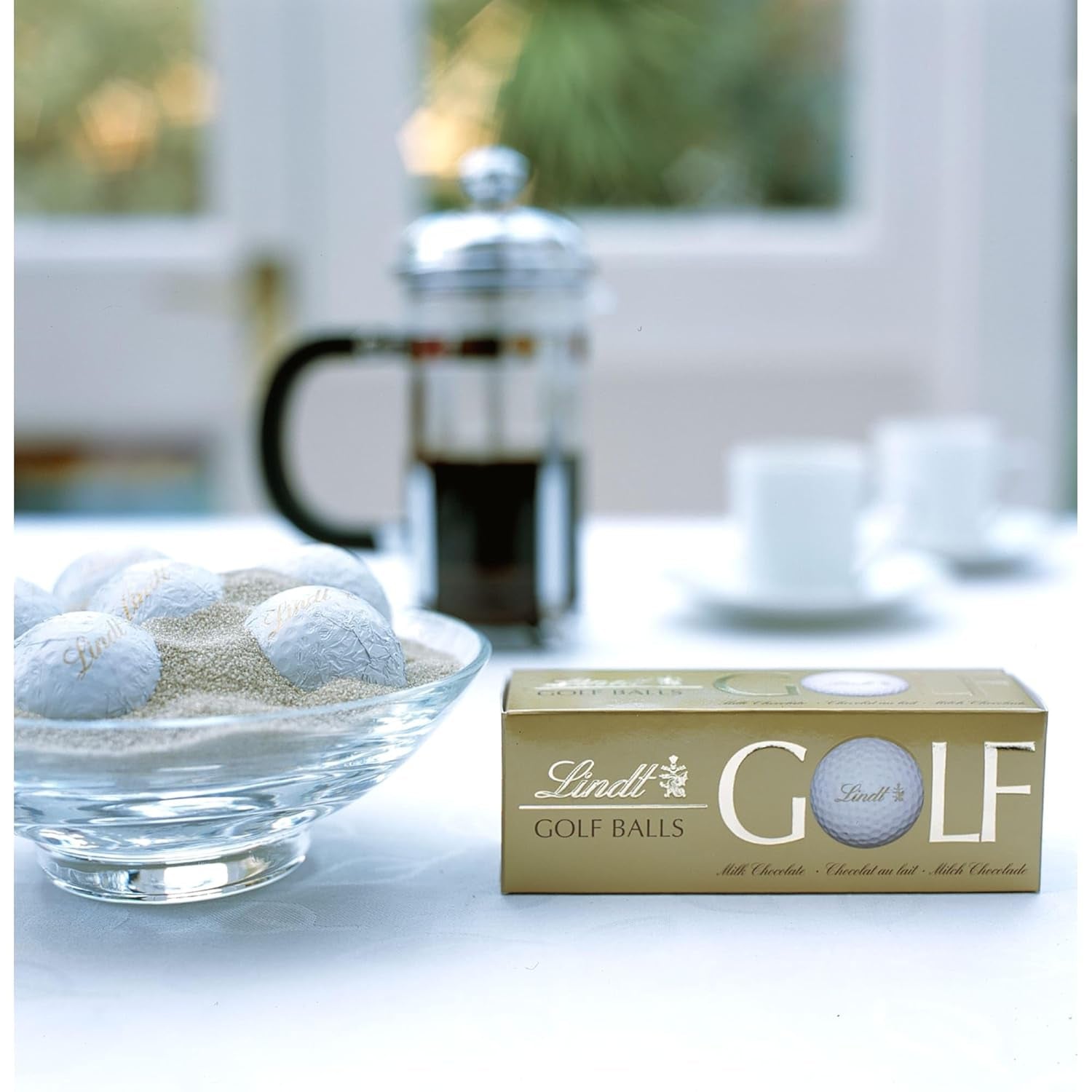 Lindt Schokolade - Golfbollar | 110 G| Drei Golfbälle Aus Lindt Vollmilch-Schokolade Mit Nougatcremefüllung Und Waffelstückchen | Pralinengeschenk | Present till golfare | Schokoladengeschenk Naty Shop