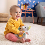 Bright Starts, Kram-a-bye babyelefantleksak med lampor, sånger, olika texturer och mer, flerfärgade Toys Bebe Naty Shop
