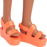 Barbie Fashionistas docka nr. 233 med svart hår, orange rutig midiklänning med rosa blommor, halsband och sandaler, HYT91