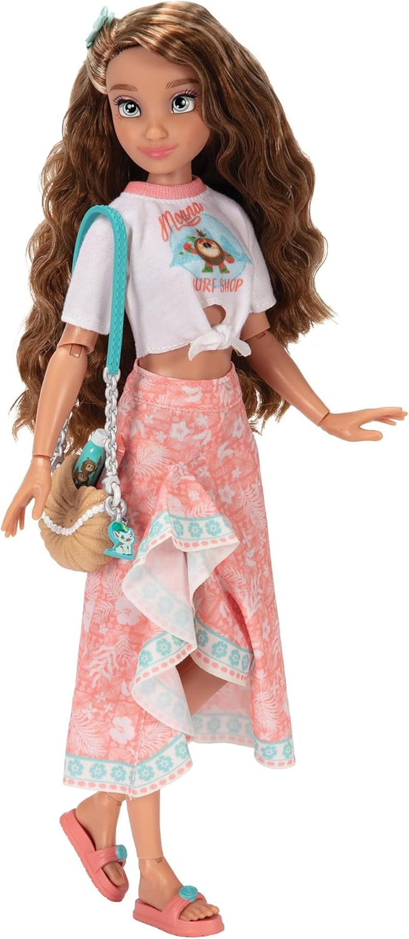 Vaiana docka med tillbehör, 29cm, 13 artikulationspunkter, officiellt licensierad av Jakks Pacific. Komplett med kombinerbara tillbehör och en gnistrande Mickey-ring!