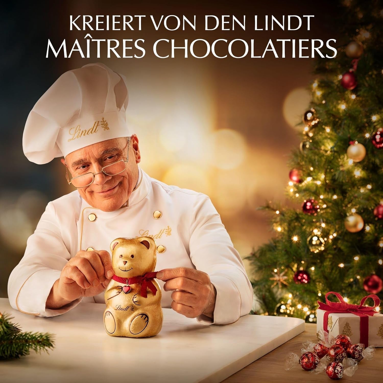 Lindt Choklad | Ask med guldbitar praliner | 180g | 18 praliner i 10 sortiment som fint sortiment av praliner, några med alkohol | Premium presentask med julpraliner