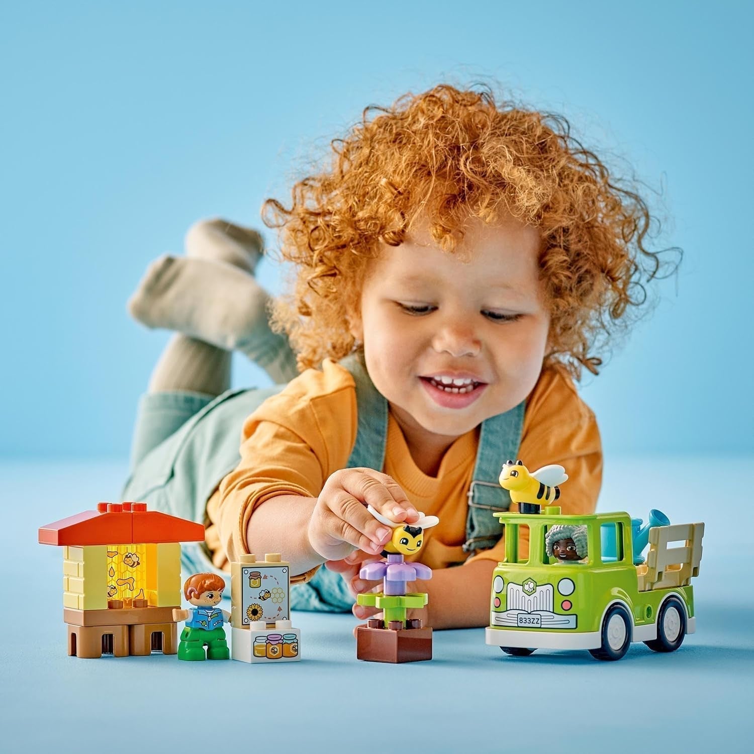 LEGO DUPLO Stadsbiodling och bikupor, pedagogisk leksak för småbarn med 2 figurer och en mobil lastbil, bygg- och ombyggnadsset, leksak för småbarn från 2 år 10419 Byggset Besuche den LEGO-Store
