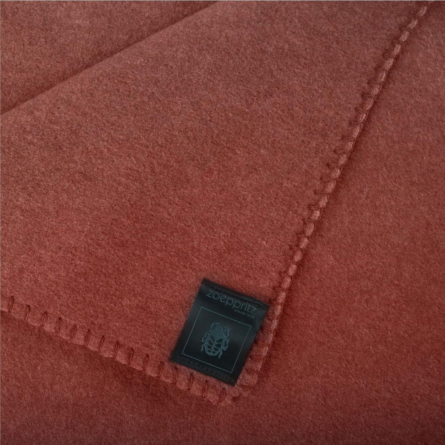 Zoepritz filt i färg: Röd, Tillverkad av 65% Polyester, 35% Viskos, Storlek: 160X200 Cm, 103291-851-160X200 Sängar och filtar 'zoepritz sedan 1828'