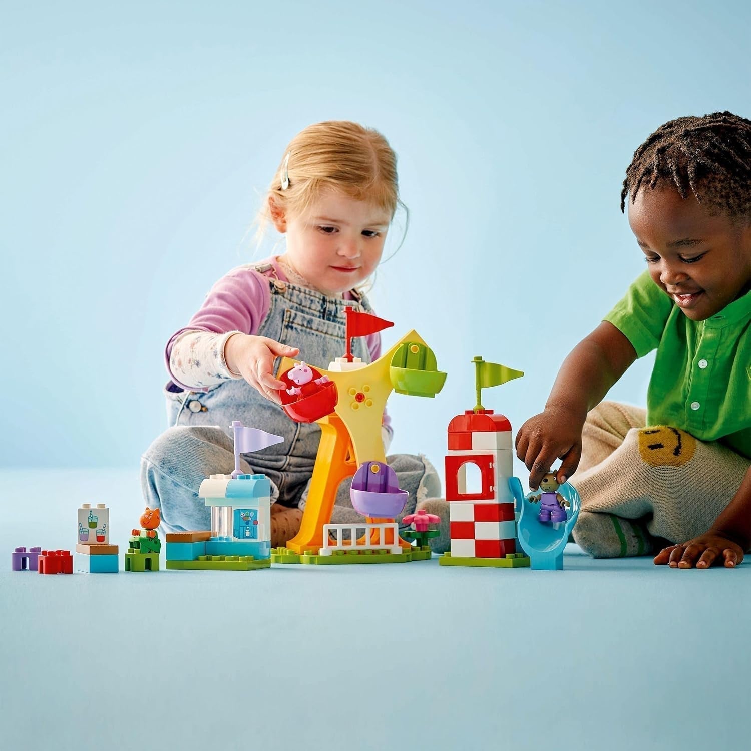 LEGO DUPLO Peppa Wutz Fairground - Barnleksaker och motoriska leksaker för åldrarna 2+ - Förskolespel med stort hjul, rutschkana och 3 figurer inklusive Mollie Kitty och Klausi Kläff - Present till barn 10453 Byggset Besuche den LEGO-Store