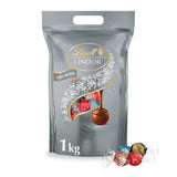 Lindt Choklad | Diverse väska LINDOR silver | 1 kg påse | 80 smält-i-munnen mjölkchokladbollar, 70 %, saltad kola och dubbelchokladsmaker | Gåva av choklad att dela