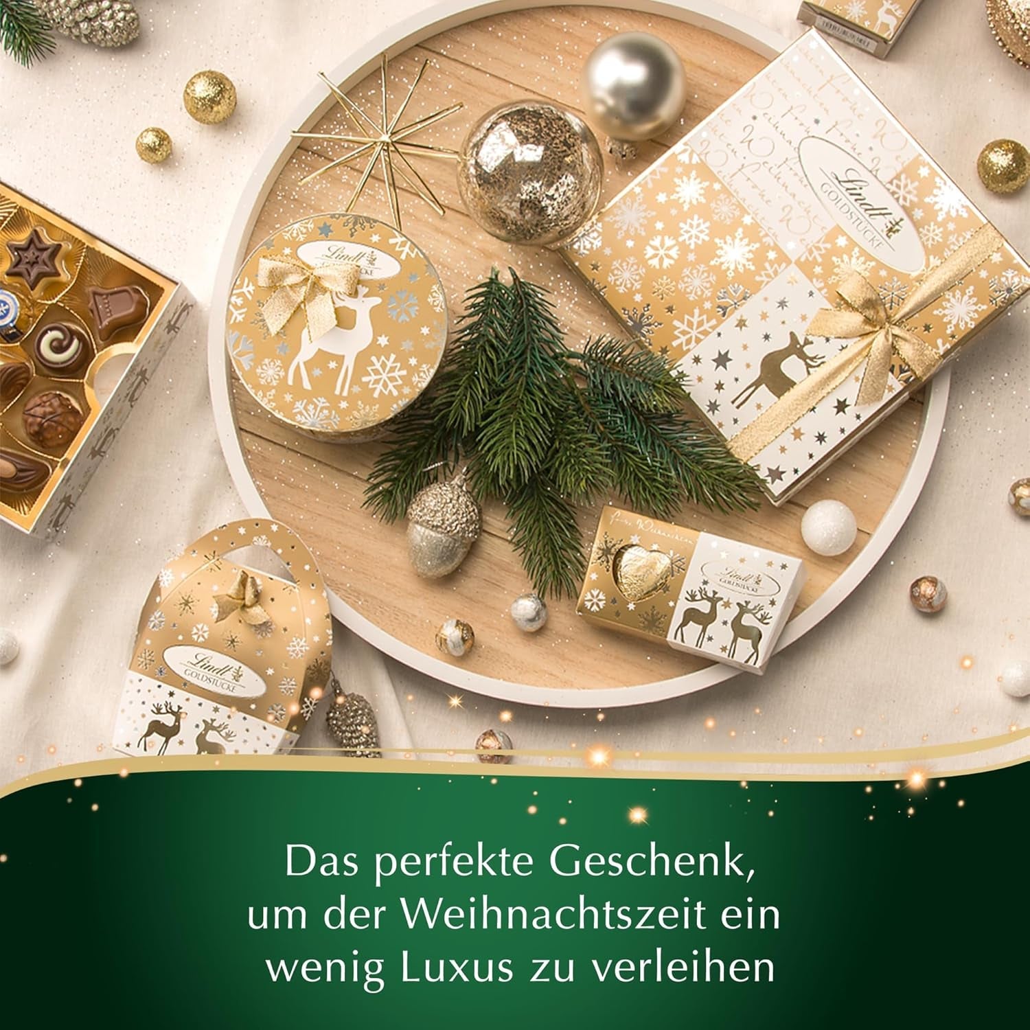 Lindt Choklad | Ask med guldbitar praliner | 180g | 18 praliner i 10 sortiment som fint sortiment av praliner, några med alkohol | Premium presentask med julpraliner