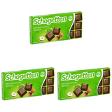 Schogetten Premium alpin mjölkchoklad med hasselnötter, 100 g chokladkaka, individuellt portionerad. En fröjd. Bit för bit.