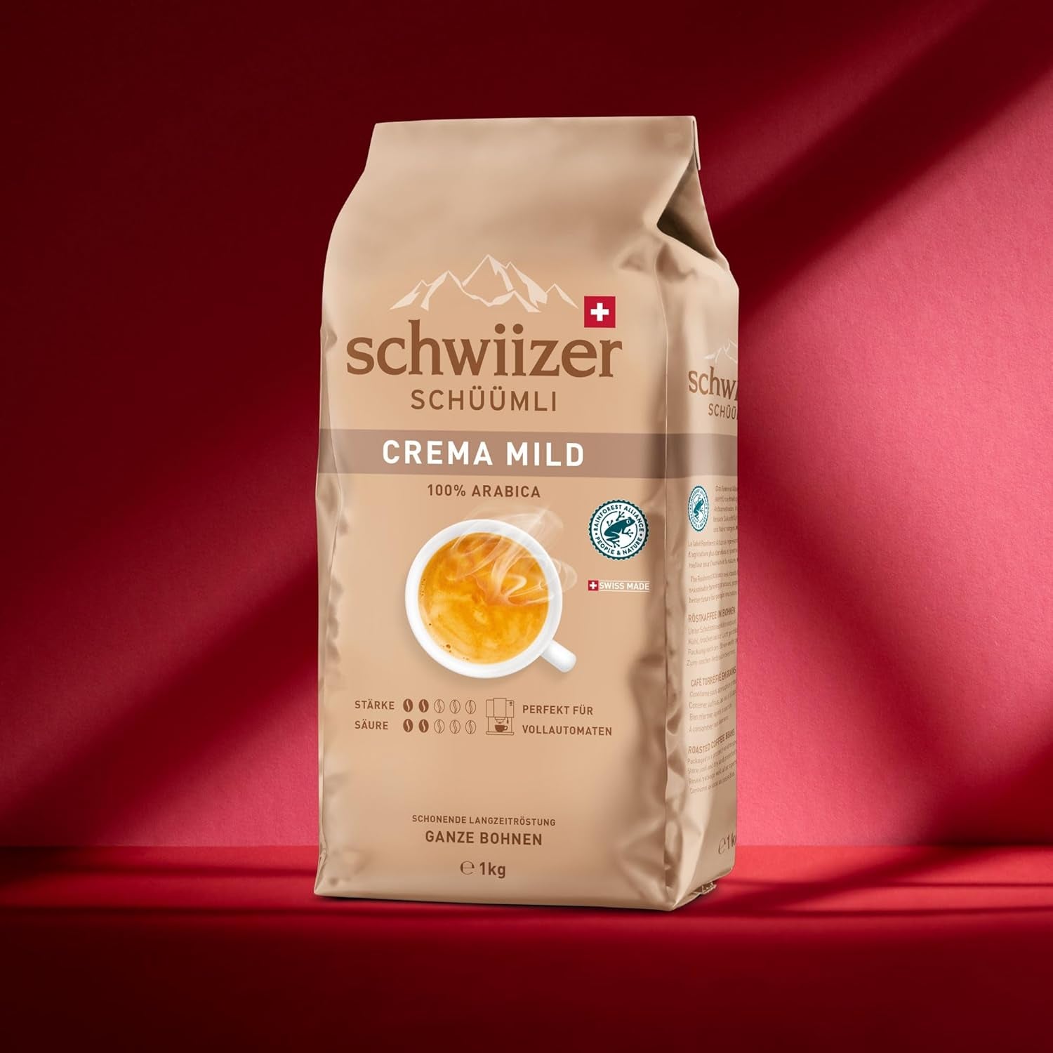 Schwiizer Schüümli Crema Mild, 100 % premium Arabica-kaffebönor, fruktiga och nötiga, för helautomatiska kaffemaskiner, 2/5 styrka, lättrostad, Rainforest Alliance-certifierad, 1 kg (förpackning med 2)
