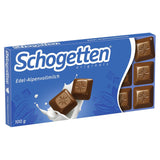 Schogetten Premium Alpine mjölkchokladkaka, 100g, individuellt portionerad. En fröjd. Bit för bit.