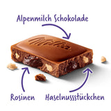 Milka druvor och hasselnötter – alpin mjölkchoklad med bitar av hasselnötter och russin – 90g