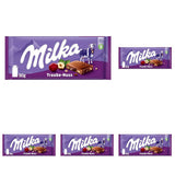 Milka druvor och hasselnötter – alpin mjölkchoklad med bitar av hasselnötter och russin – 90g
