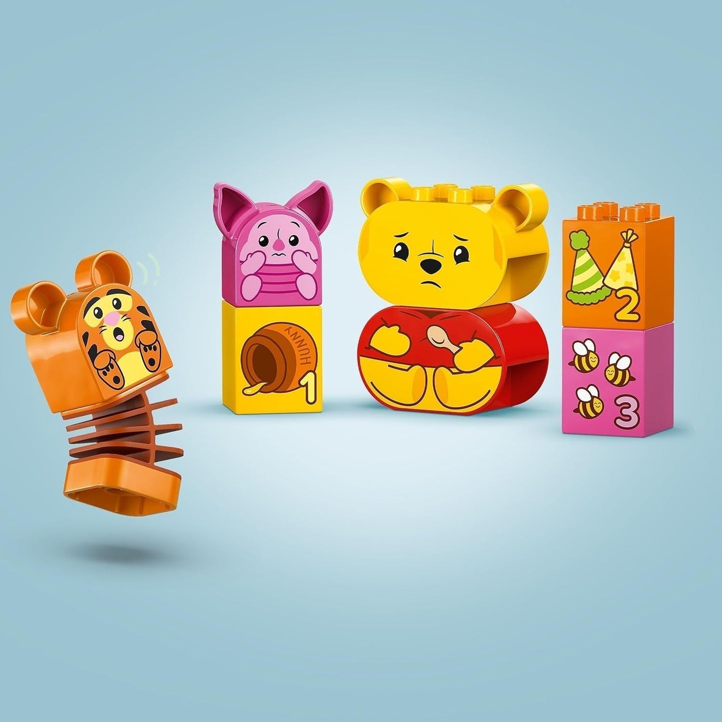 LEGO DUPLO - Disney Nalle Puhs födelsedagsfest - pedagogisk leksak för förskolebarn - set med 3 minifigurer inklusive Nalle Puh, Tiggen och Nasse - presentidé för pojkar och flickor från 1,5 år 10457 Beuche byggset i LEGO-Store