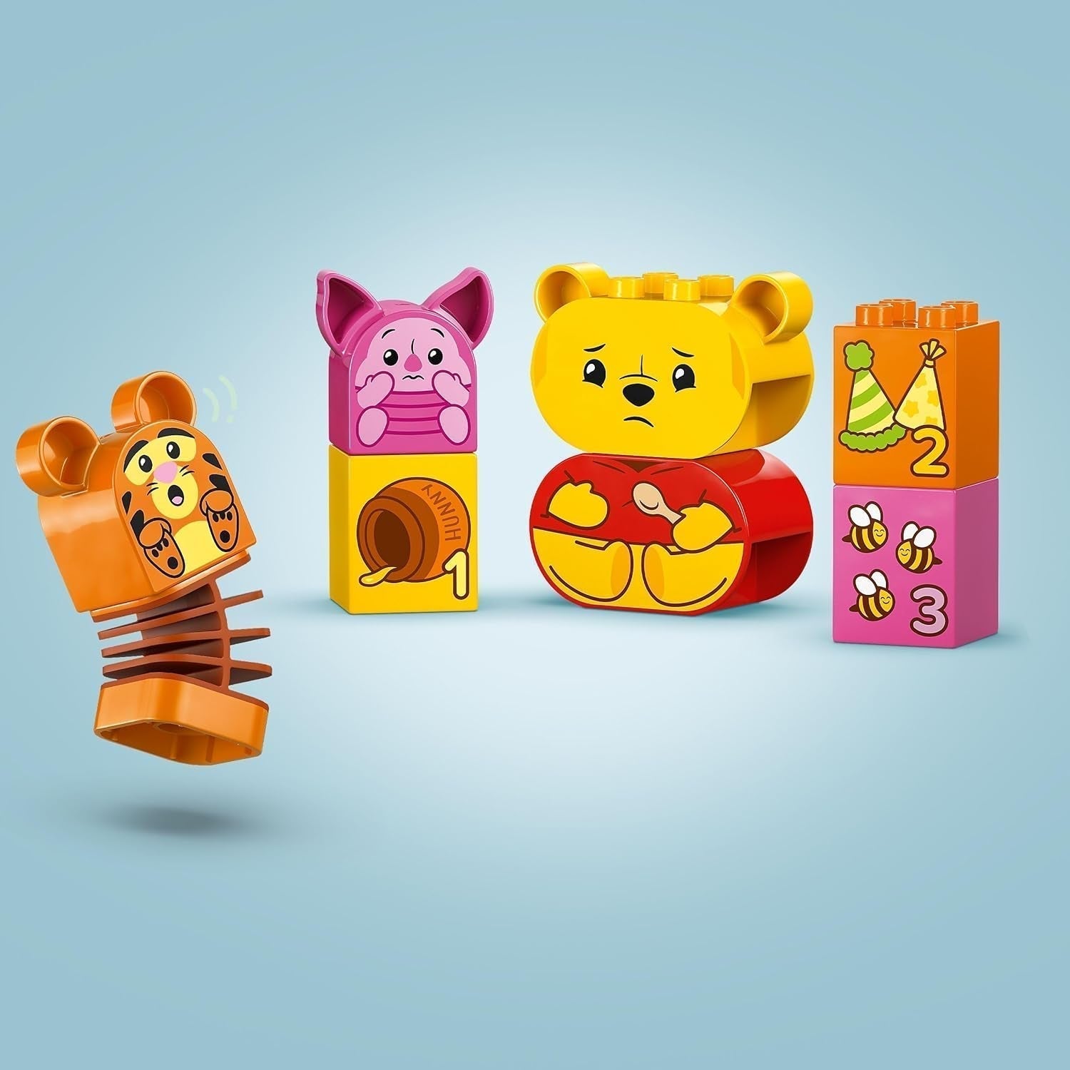 LEGO DUPLO - Disney Nalle Puhs födelsedagsfest - pedagogisk leksak för förskolebarn - set med 3 minifigurer inklusive Nalle Puh, Tiggen och Nasse - presentidé för pojkar och flickor från 1,5 år 10457 Beuche byggset i LEGO-Store