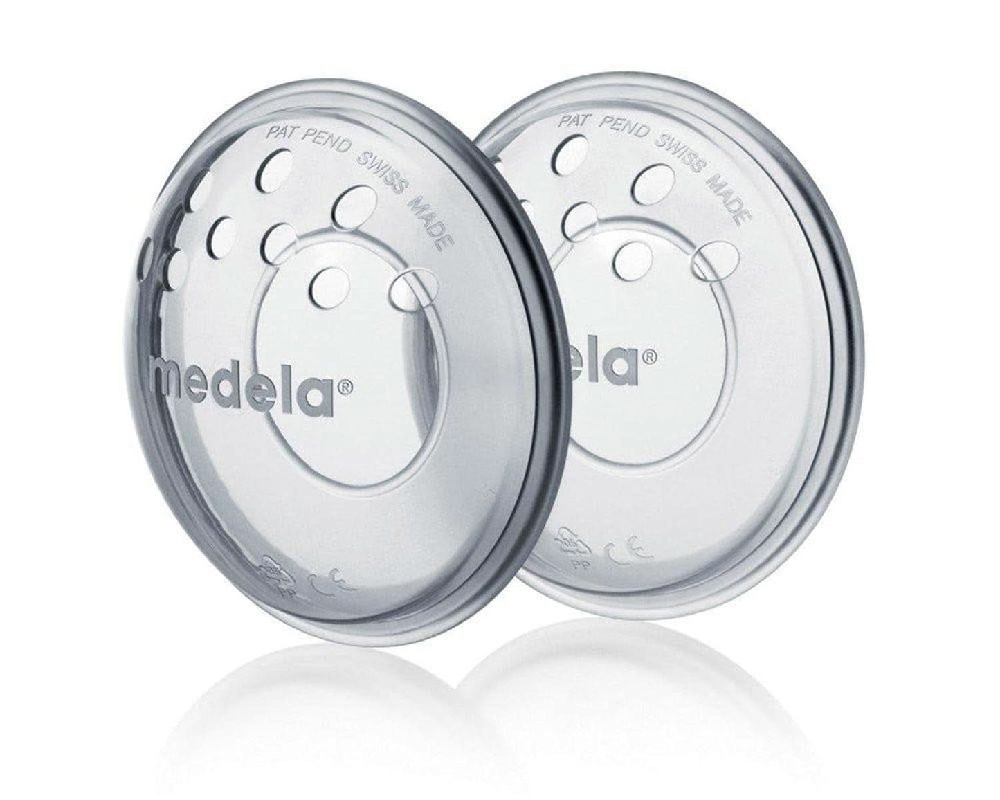 Medela bröstskal - BPA-fria, tillverkade av mjuk silikon, med ventilationshål som andas, inkluderar 2 skal Tillbehör Mat och amning Bebe Naty Shop