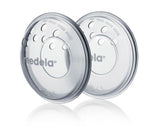 Medela bröstskal - BPA-fria, tillverkade av mjuk silikon, med ventilationshål som andas, inkluderar 2 skal Tillbehör Mat och amning Bebe Naty Shop