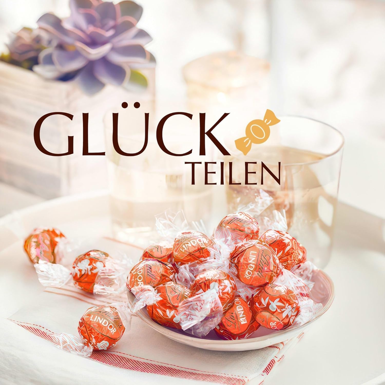 Lindt LINDOR Röda Orange Chokladbollar | 1 kg återförslutningsbar påse | ca. 80 chokladgodisar med smält-i-mun-fyllning | Bulkpaket, chokladpresent
