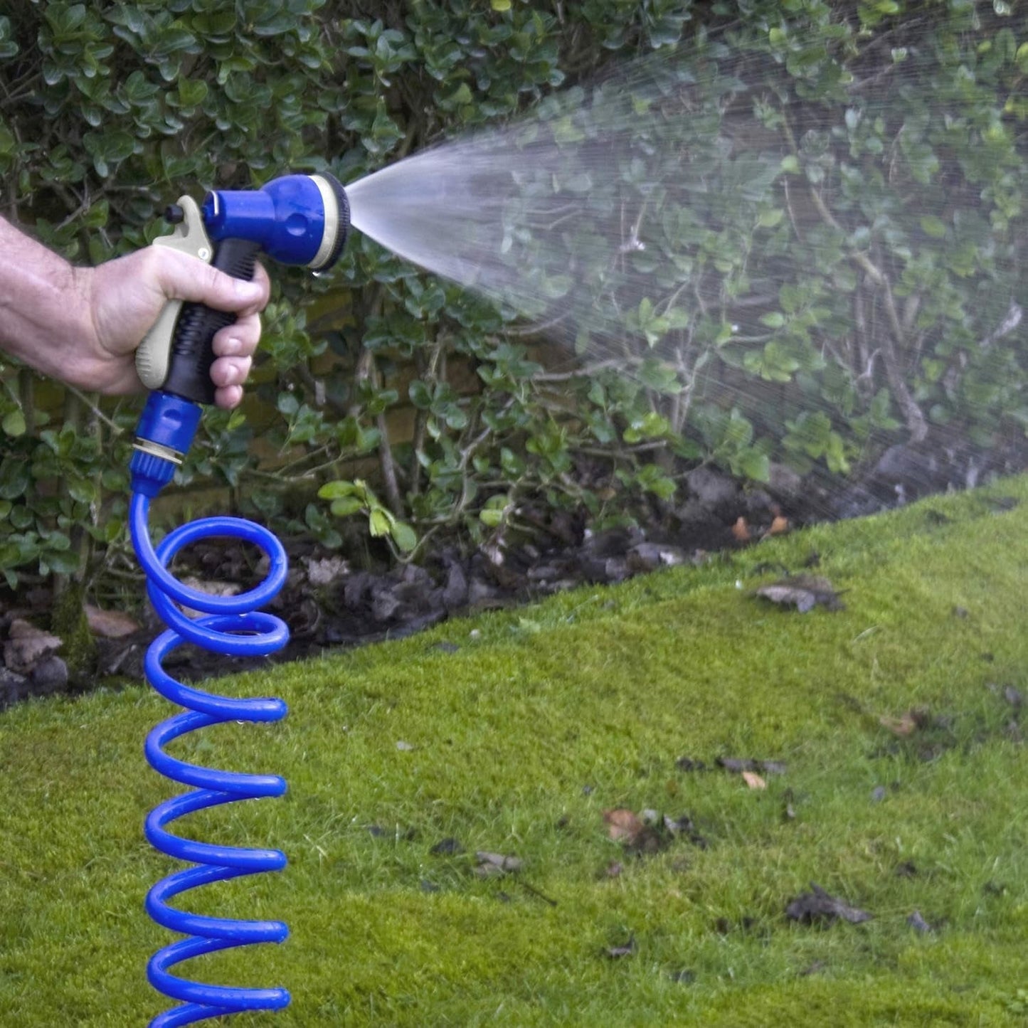 TATAY spiralslangset 10 m med plasttillbehör med UV-skydd, perfekt för terrasser och små trädgårdar.