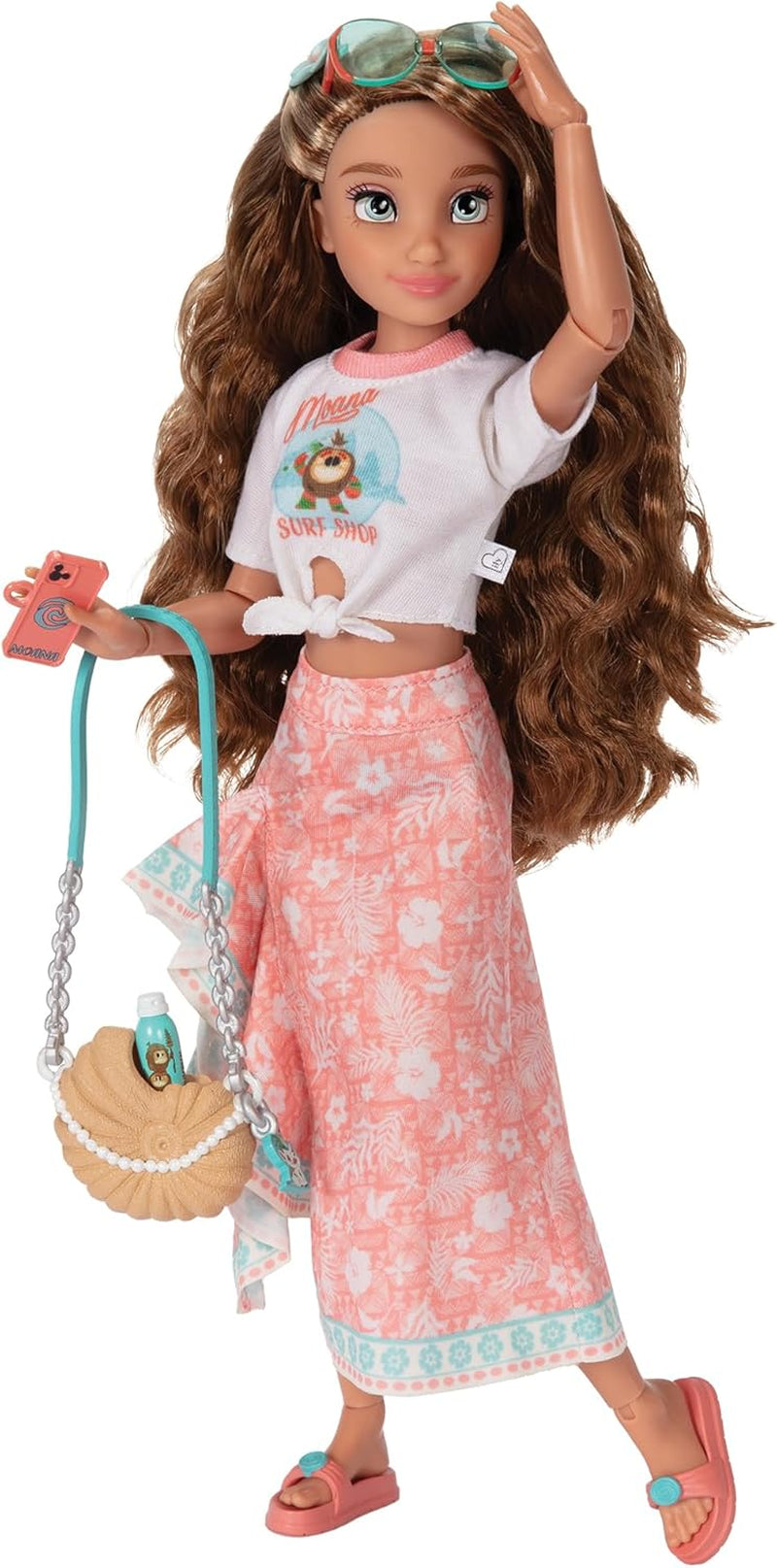 Vaiana docka med tillbehör, 29cm, 13 artikulationspunkter, officiellt licensierad av Jakks Pacific. Komplett med kombinerbara tillbehör och en gnistrande Mickey-ring!