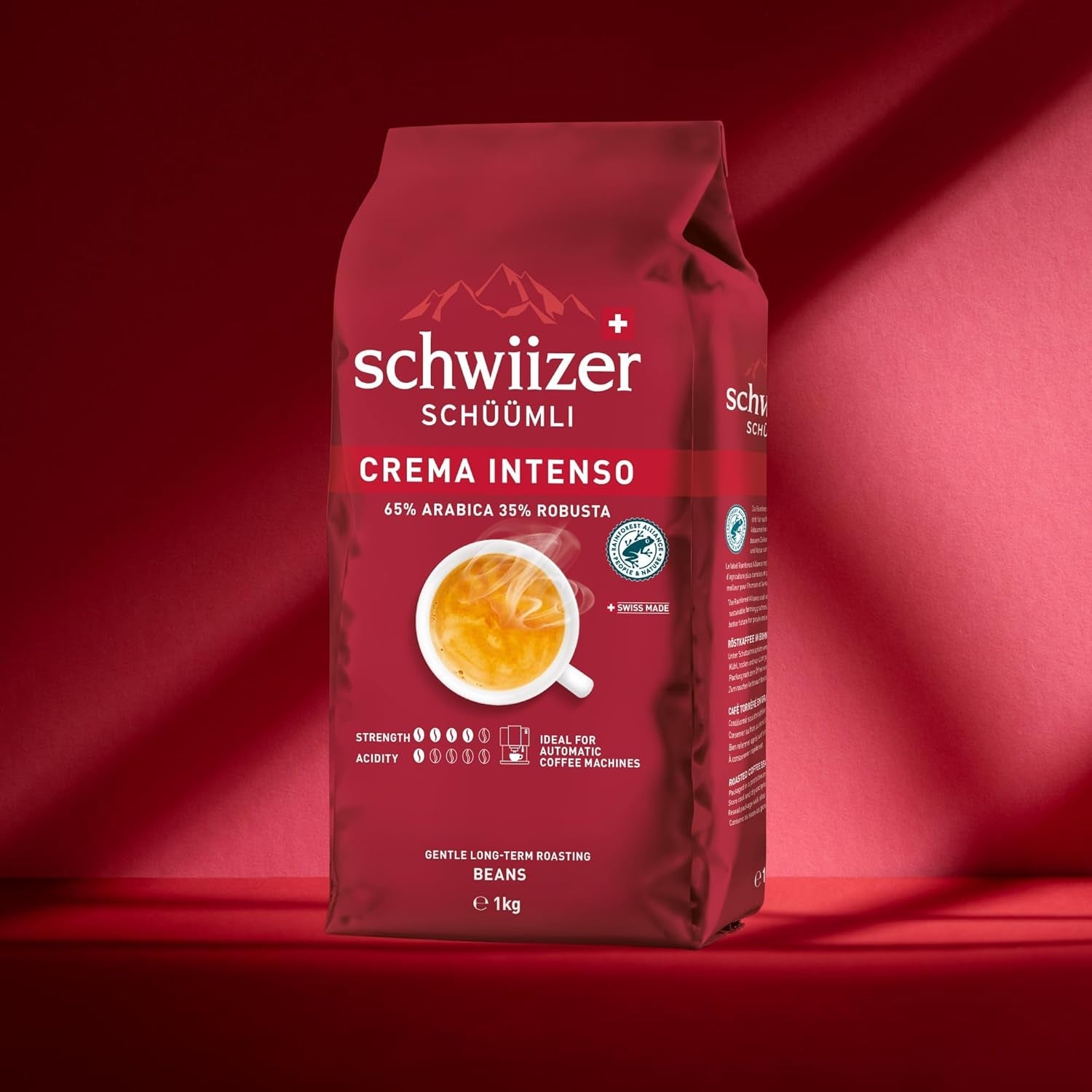 Schwiizer Schüümli Intenso, Arabica/Robusta kaffebönor, fylliga och intensiva, idealisk för automatiska espressomaskiner, styrka 4/5, medelrostad, Rainforest Alliance, 1 kg