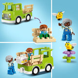 LEGO DUPLO Stadsbiodling och bikupor, pedagogisk leksak för småbarn med 2 figurer och en mobil lastbil, bygg- och ombyggnadsset, leksak för småbarn från 2 år 10419 Byggset Besuche den LEGO-Store
