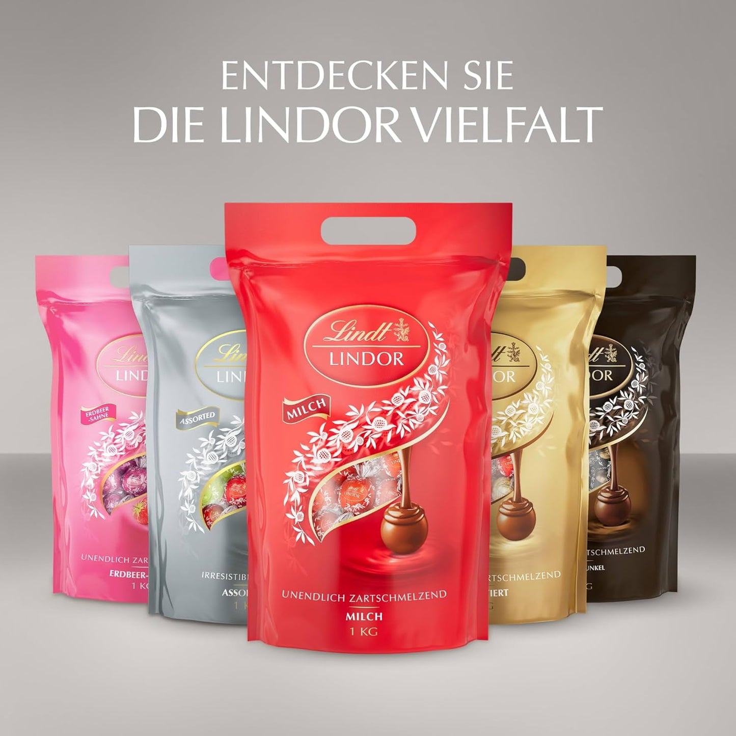 Lindt Choklad | Diverse väska LINDOR silver | 1 kg påse | 80 smält-i-munnen mjölkchokladbollar, 70 %, saltad kola och dubbelchokladsmaker | Gåva av choklad att dela