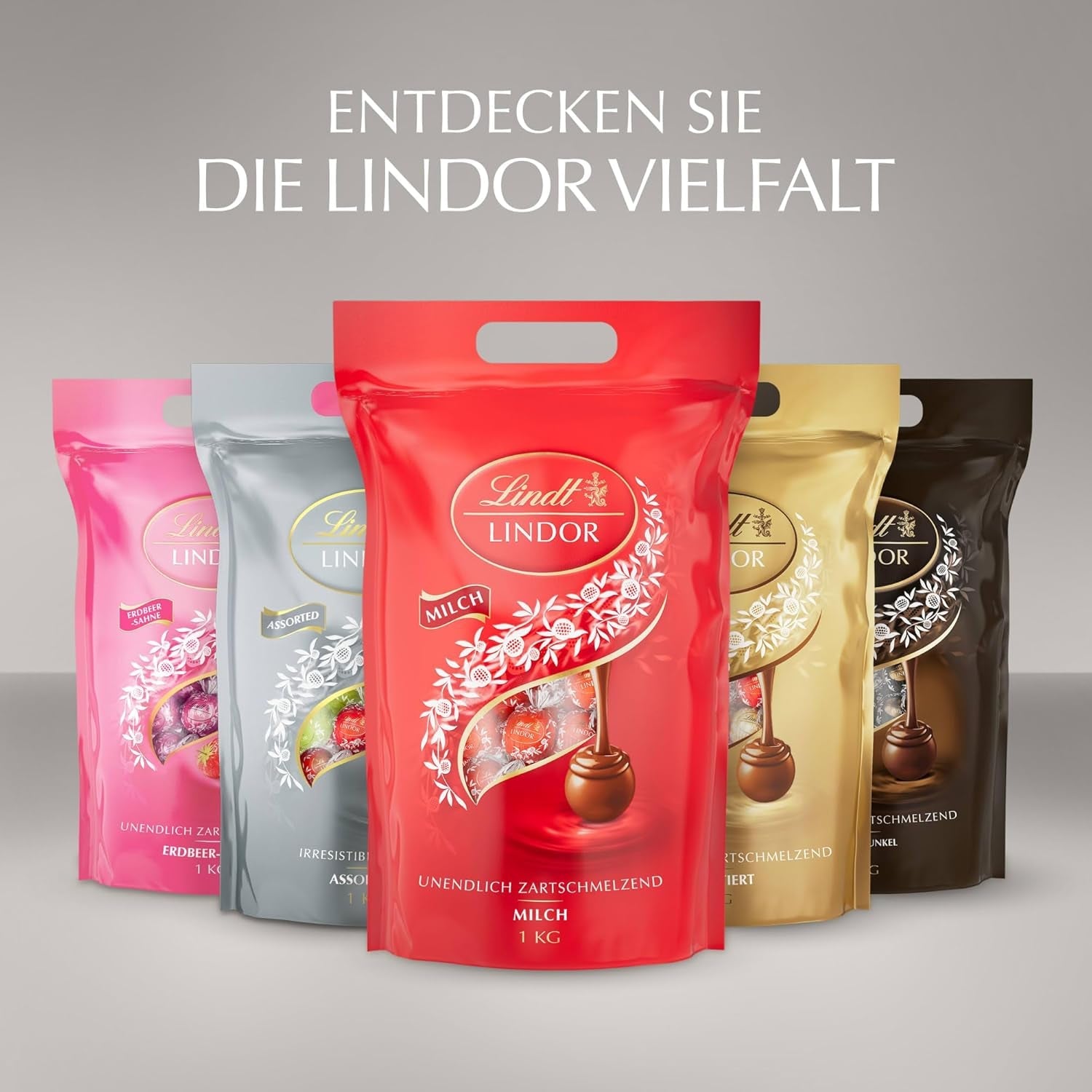 Lindt Choklad | Diverse väska LINDOR silver | 1 kg påse | 80 smält-i-munnen mjölkchokladbollar, 70 %, saltad kola och dubbelchokladsmaker | Gåva av choklad att dela