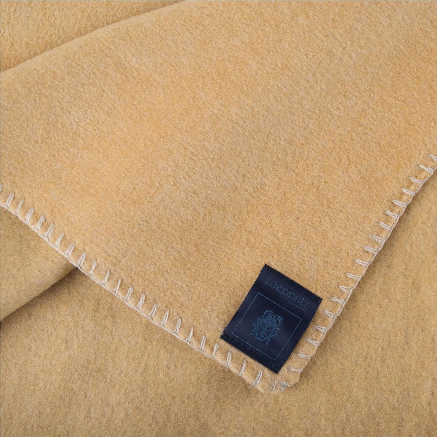Zoepritz filt i färg: Beige, Tillverkad av 65% Polyester, 35% Viskos, Storlek: 160X200 Cm, 103291-810-160X200, 810 Camel Sängar och filtar 'zoepritz sedan 1828'