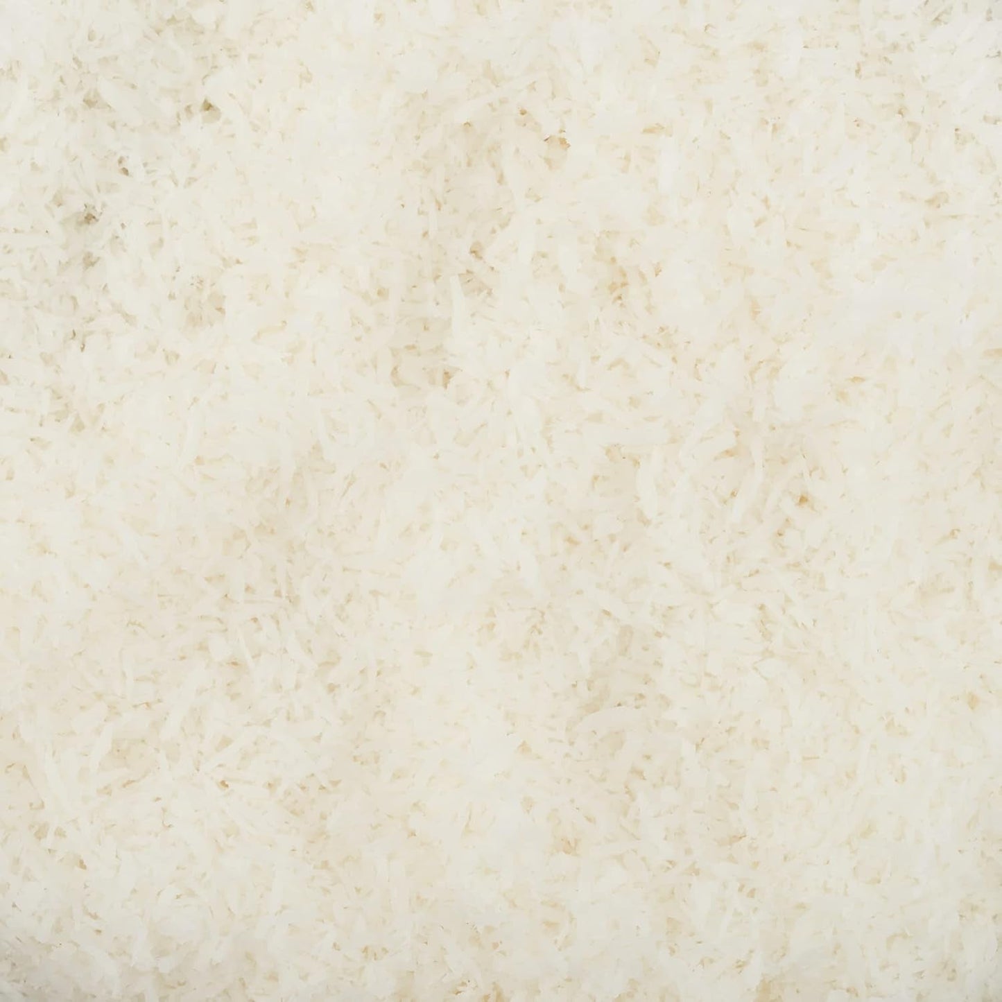 Strimlad ekologisk kokosnöt - 200g. Torkade kokoschips Osötade och torra. Kokosflingor. Soltorkade kokoschips. Utmärkt som mellanmål och för söta recept Naty Shop Dehydrated Products