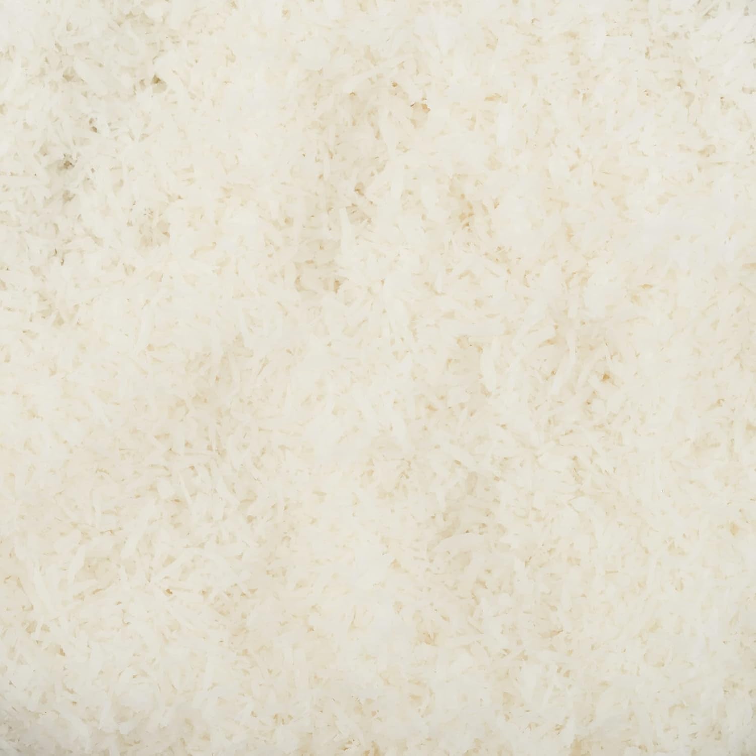 Strimlad ekologisk kokosnöt - 200g. Torkade kokoschips Osötade och torra. Kokosflingor. Soltorkade kokoschips. Utmärkt som mellanmål och för söta recept Naty Shop Dehydrated Products