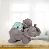 Zen'Light Statue Buddha Bonze Sova på elefant - Zen-atmosfär i ditt heliga utrymme - vacker gynnsam figur -H 9,5 cm, Brun & Grön Statyetter och skulpturer Naty Shop